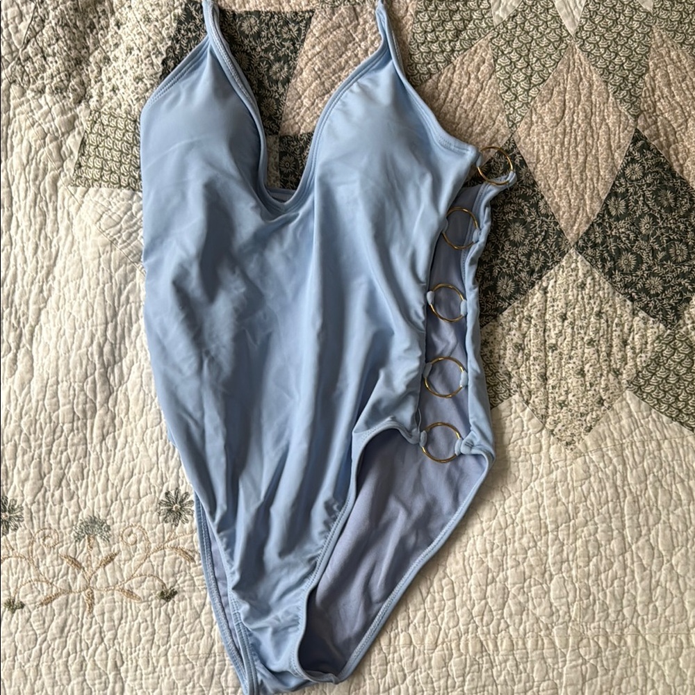 Light Blue One-Piece Swimsuit with Gold Rings